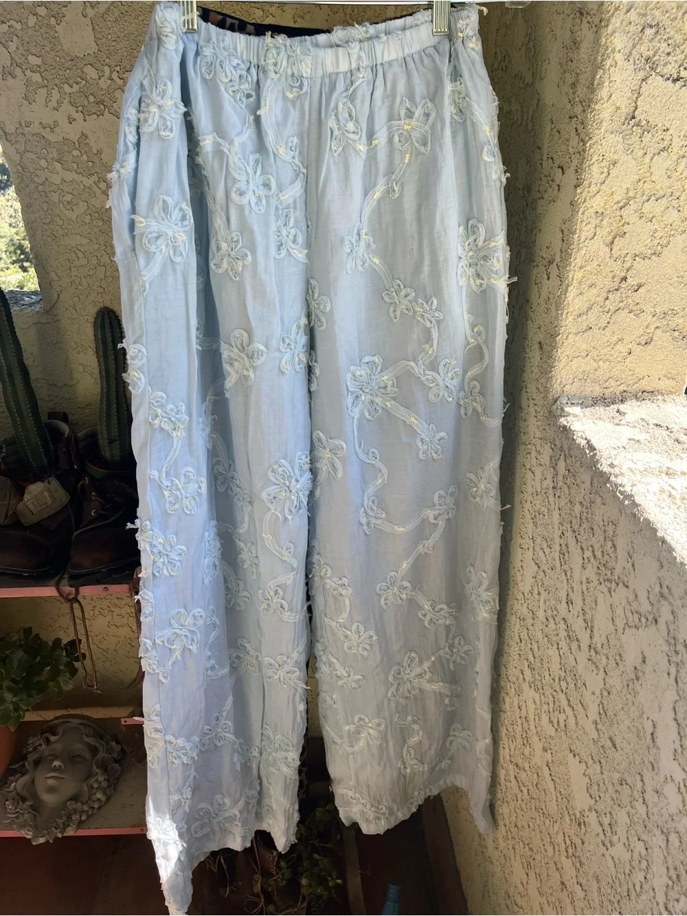 2 pairs of pants. Medium but run largeSPANX Light Blue Embroidered Wide leg